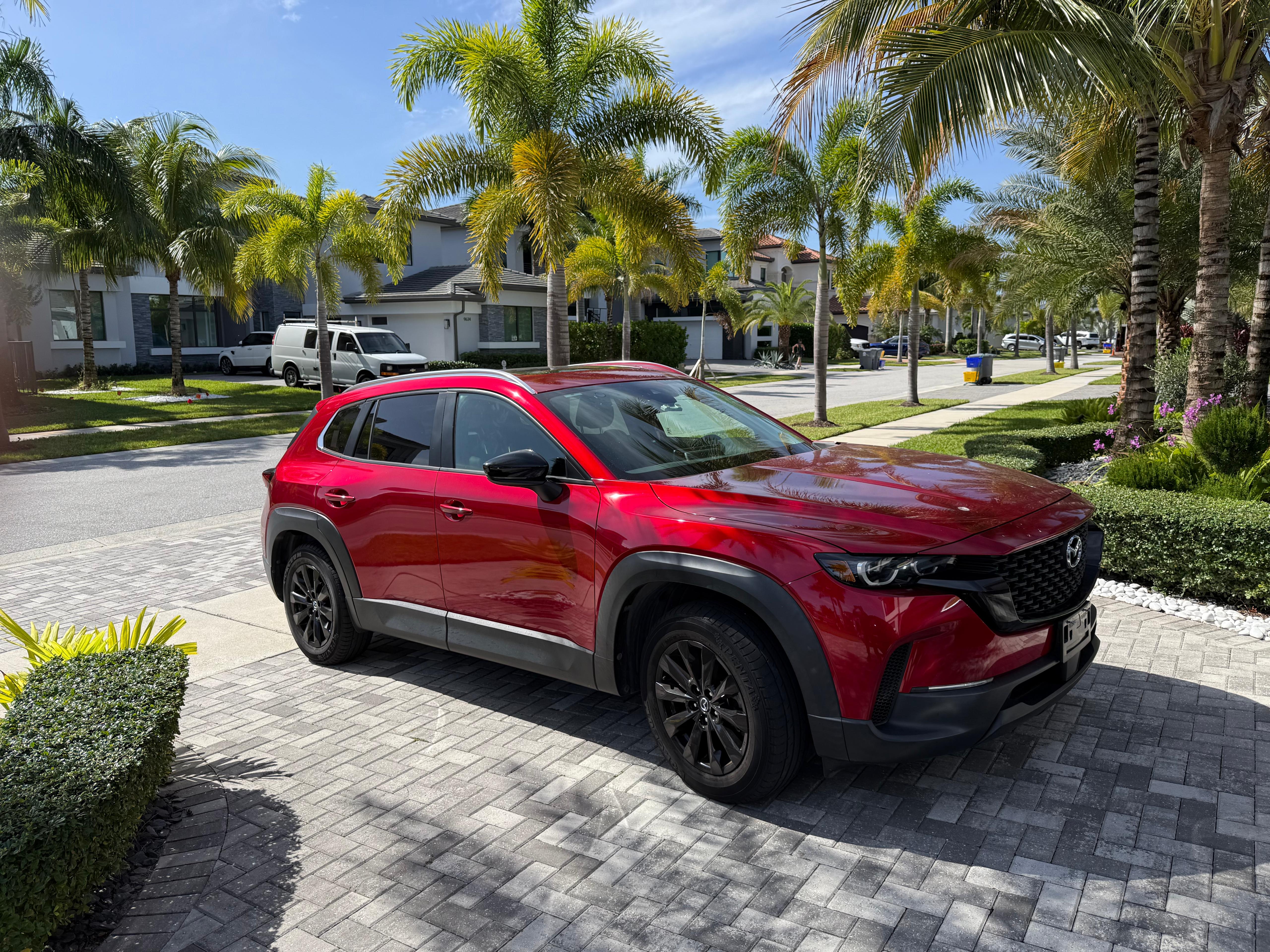 Red Mazda SUV after mobile detailing service